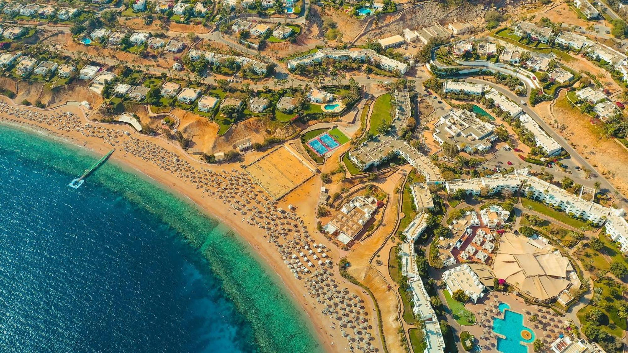 Domina Coral Bay Resort, Diving , Spa & Casino Sharm el Sheikh Esterno foto Aerial view of the bay